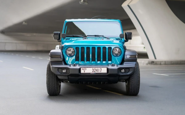 Blue Jeep Wrangler Limited Sport Edition convertible Photo 2