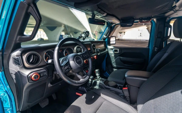 Blue Jeep Wrangler Limited Sport Edition convertible Photo 4
