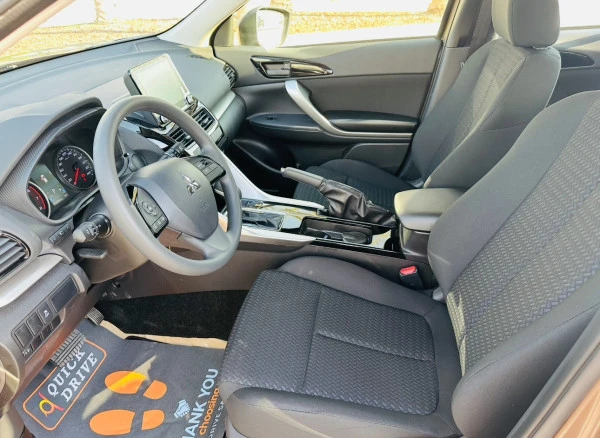 Brown Mitsubishi Eclipse Photo 3