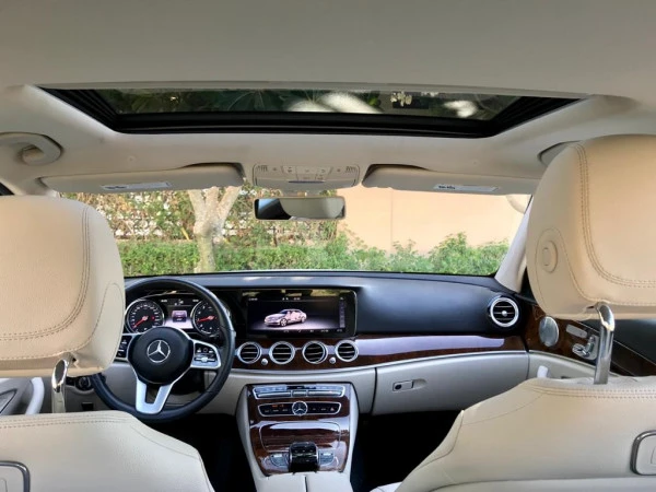 White Mercedes E Class Photo 4